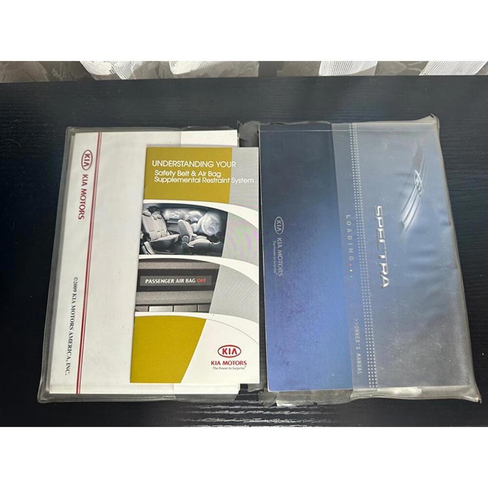 2009 Kia Spectra Owner’s Manual & Air Bag Safety Booklet Set